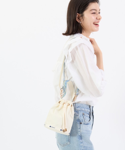 DRAWSTRING BUCKET XBODY サンドヴォヤージュ