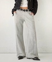 【WHO'S WHO gallery】スウェットミディフレアスタッズパンツ