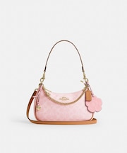 【公式】テリ ショルダー バッグ・シグネチャー キャンバス・チャーム