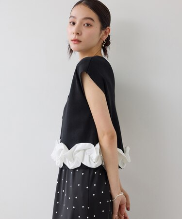 裾立体フリルドッキングトップス