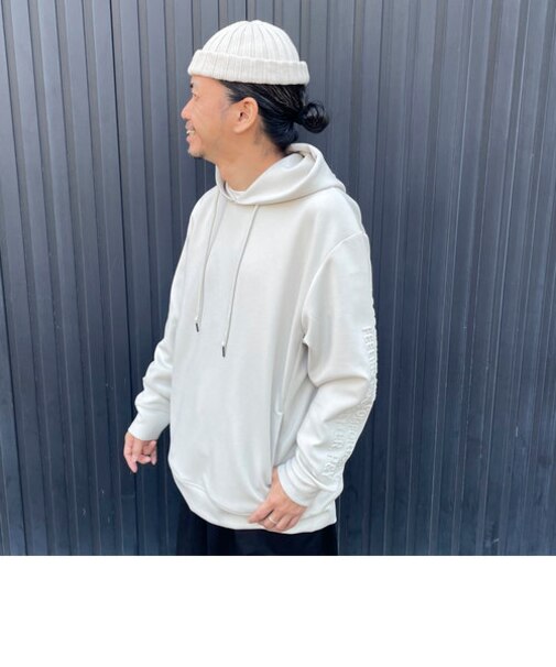 ダンボールニット メッセージ袖エンボスパーカ