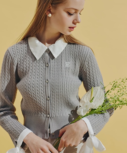 袖リボンケーブルカーディガン