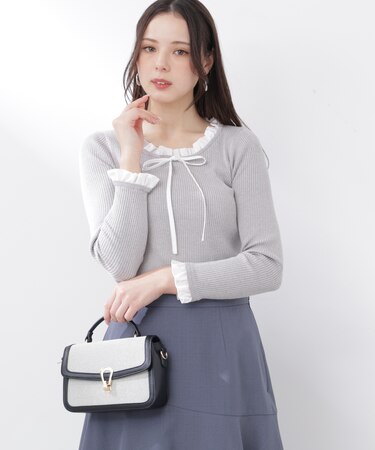 リボン付きフリルニットトップス