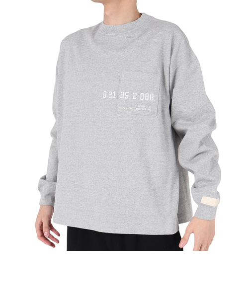 ニューバランス（new balance）1000 ミルナンバリングプリントロングスリーブ Tシャツオーバーサイズフィット AMT35104AG