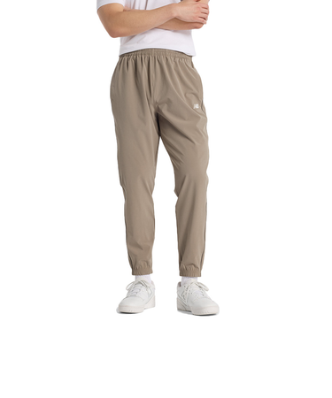 ニューバランス（new balance）ウーブントラックスジョガーパンツ AMP51205DOK