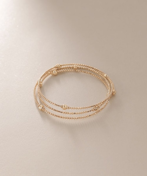 【ココシュニック】形状記憶　バングル　ブレスレットK10ホワイトイエロー K10ハニー カットボール 形状記憶バングル｜ココシュニックの通販