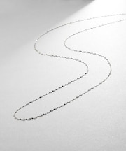 プラチナ フラワークロスチェーン ロングネックレス(90cm)