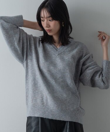 レイヤーネックメランジラメニット