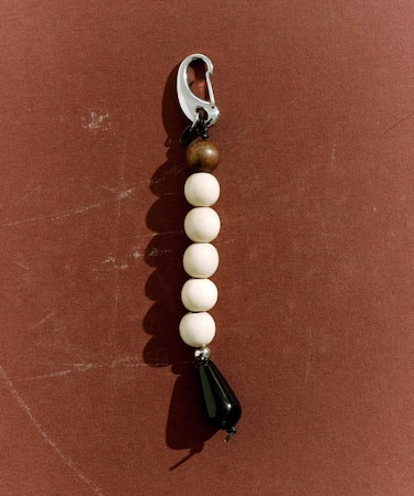SMELLY so’ wood onyx key charm