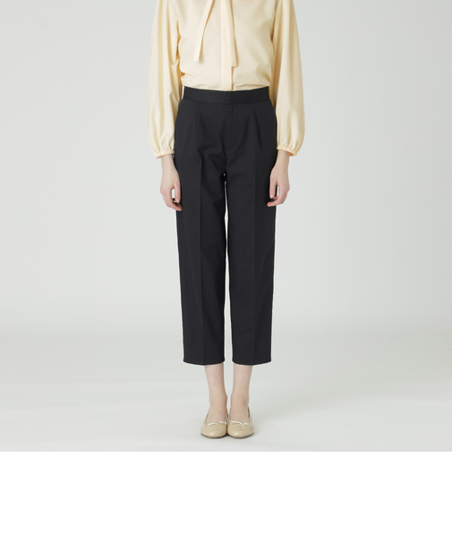 サイロクリアスパンツイルスリムパンツ