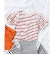 肩フリルフラワーモチーフTシャツ