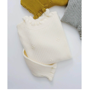 フリルリブニット