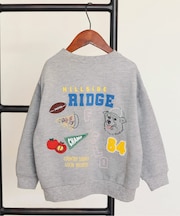 スーベニア刺繍トレーナー