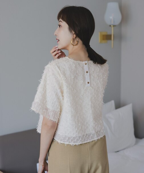 バックゴールド釦ジャガードトップス