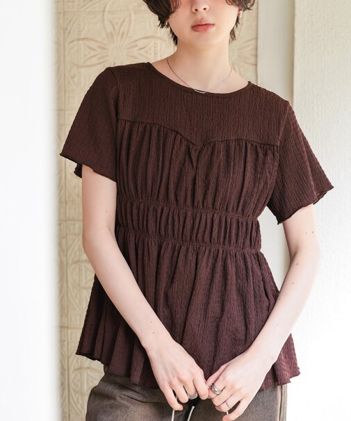 シャーリングペプラムトップス
