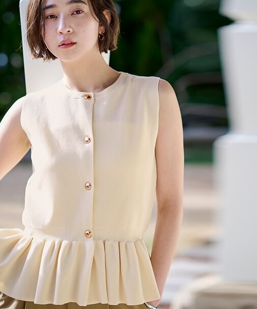 ゴールド釦ペプラムノースリーブニット