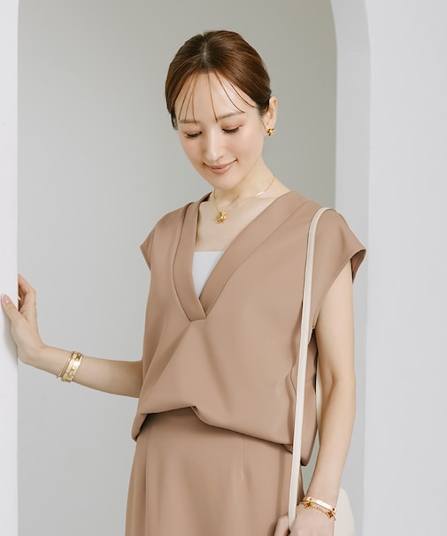 Ｖネックポンチノースリーブトップス