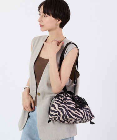E/W CITY DRAWSTRING BAG  アップタウンラフィアゼブラ/ブラック