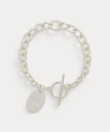 シルバープレーテッド ロゴ チャーム フレックス ブレスレット