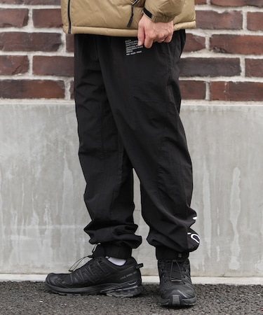 RVCA/ロングパンツ ジョガーパンツ 撥水 防風 MIL NYLON PT セットアップ対応 BF042-705 ルーカ メンズ ムラサキスポーツ