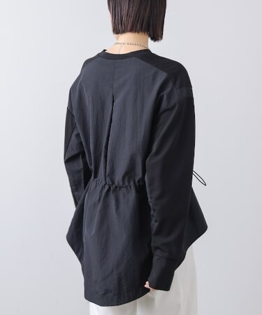 ポンチ異素材ドッキングプルオーバー