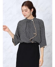 ジオメトリックラッフルタイブラウス