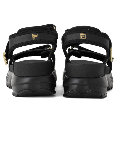 USS24058045 Disruptor Wedge Sandal Lux *BLACK/GOLD 677871