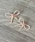アクリルリボンピアス