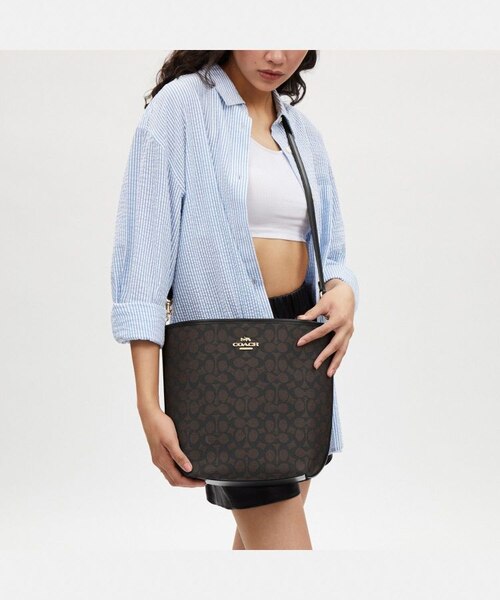 公式】シティ ラージ バケット バッグ・シグネチャー キャンバス