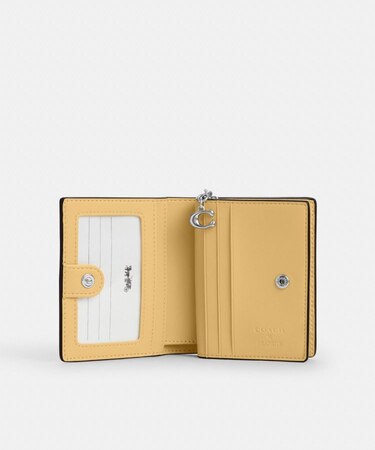 COACH X PEANUTS】スナップ ウォレット・チャーリー・ブラウン｜コーチ 