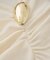 メタルパーツ付ニットトップス