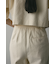 アウトドットフォルムパンツ