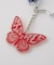 BUTTERFLY AND OVAL LOGO KEY CHARM