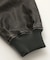 EMBOSSED LOGO PATCH DISTRESSED FAUX LEATHER JACKET