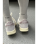 emmiロゴセミシアーリブハイソックス