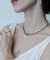 SMELLY so’　oval plate cord necklace
