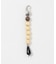 SMELLY so’　wood onyx key charm
