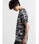 シェラック/SHELLAC メッセージ総柄グラフィック クルーネック半袖Tシャツ