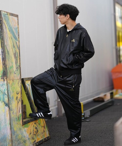 adidas/TV847 Stadium Gold ルーズフィット フードトラックトップ