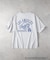 エムエルビー 【別注】ワッペンプリントTシャツ