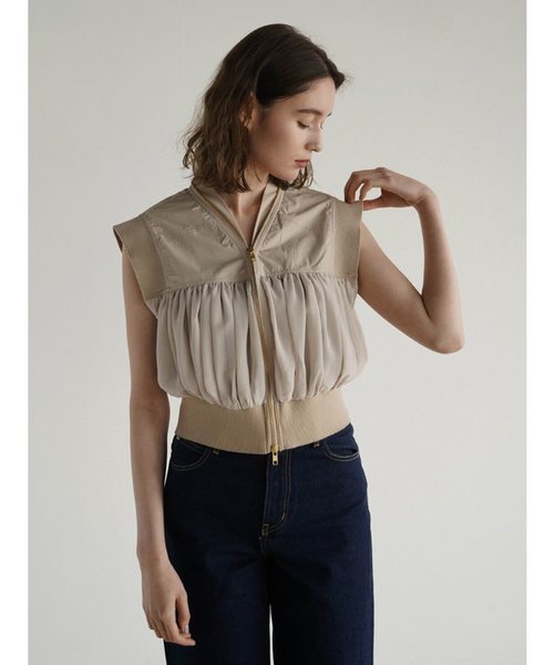 Sheer switching compact vest