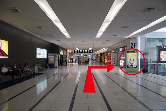 2.Continue straight, go through the passageway visible on your right, and head towards the access plaza.