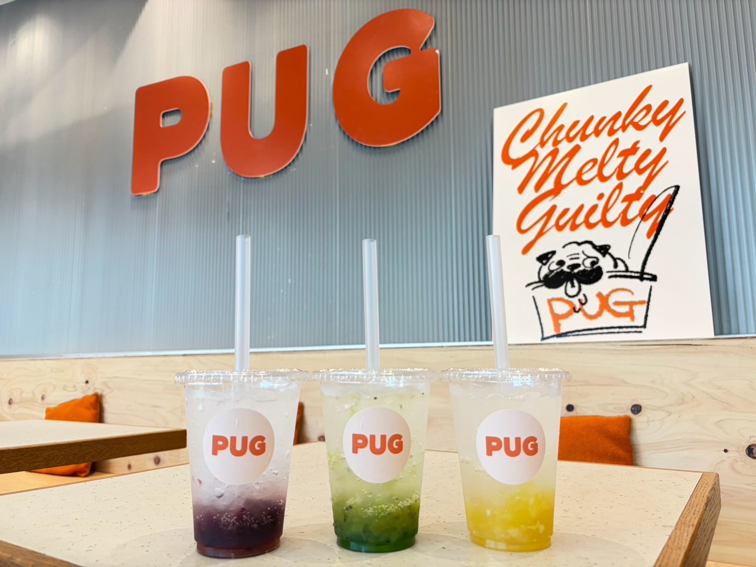 In-store PUG logo background